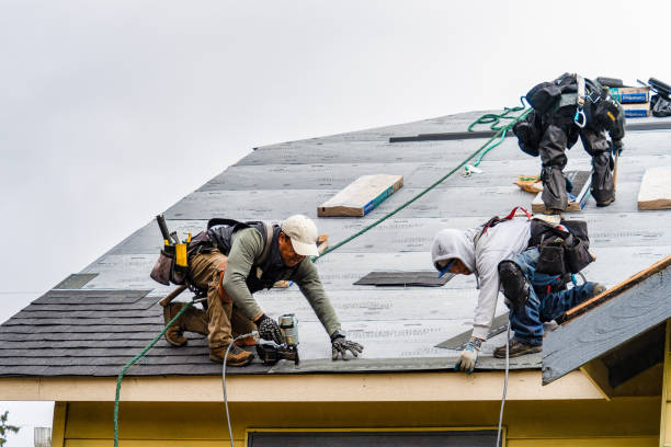 Professional Gutter Installation technician working in Newton Upper Falls, MA